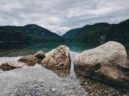 photo of boulders on lake